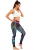 Sportlegging, yoga legging in decoratief bladdesign. Zwart, roze, groen en blauw
