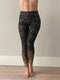 Sport Legging zwart met gouden spots. Lagere tailleband.