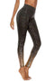 Sport Legging zwart met gouden spots. Lagere tailleband.