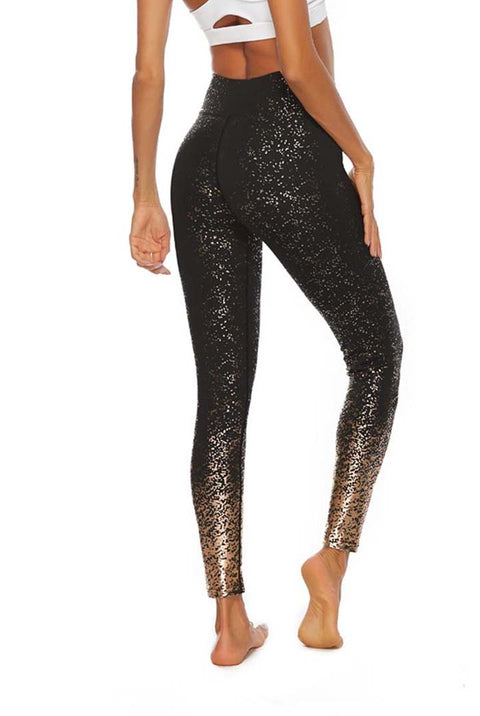 Sport Legging zwart met gouden spots. Lagere tailleband.