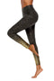 Sport Legging zwart met gouden spots. Lagere tailleband.