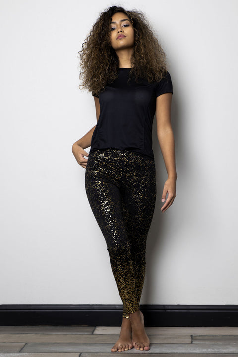 Sport Legging zwart met gouden spots. Lagere tailleband.