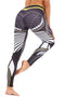 Sportlegging, yoga legging met abstract blad design in zwart, wit en gele kleurcombinatie