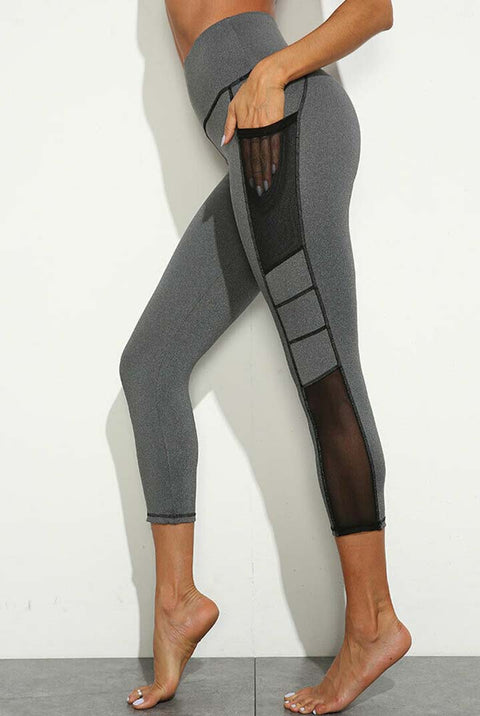 Ultimate Fit sportlegging in grijs met een hoge taille en zwarte stiksels en accenten